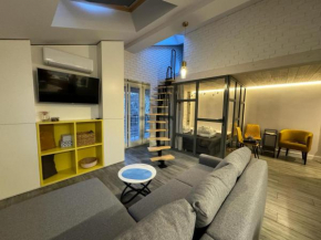 Balcony Bliss Main Square Loft